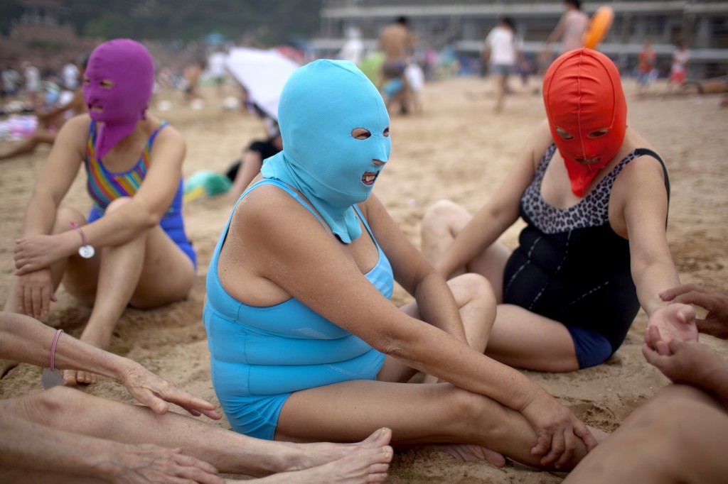 Odd Face-masked Swimmers In China