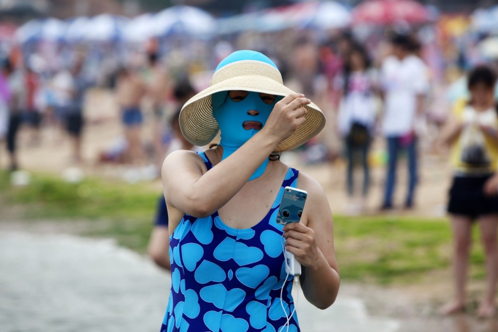 Odd Face-masked Swimmers In China