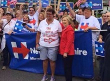 Hillary Clinton With Unknown Woman Wearing a Shirt with Awful Statement
