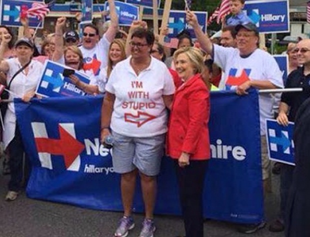 Hillary Clinton With Unknown Woman Wearing a Shirt with Awful Statement