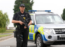 A Black Man Holding Fire Arms Threatened Policemen