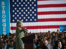 Hillary Clinton Grabbing Crotch of a Man Onstage in a Photograph