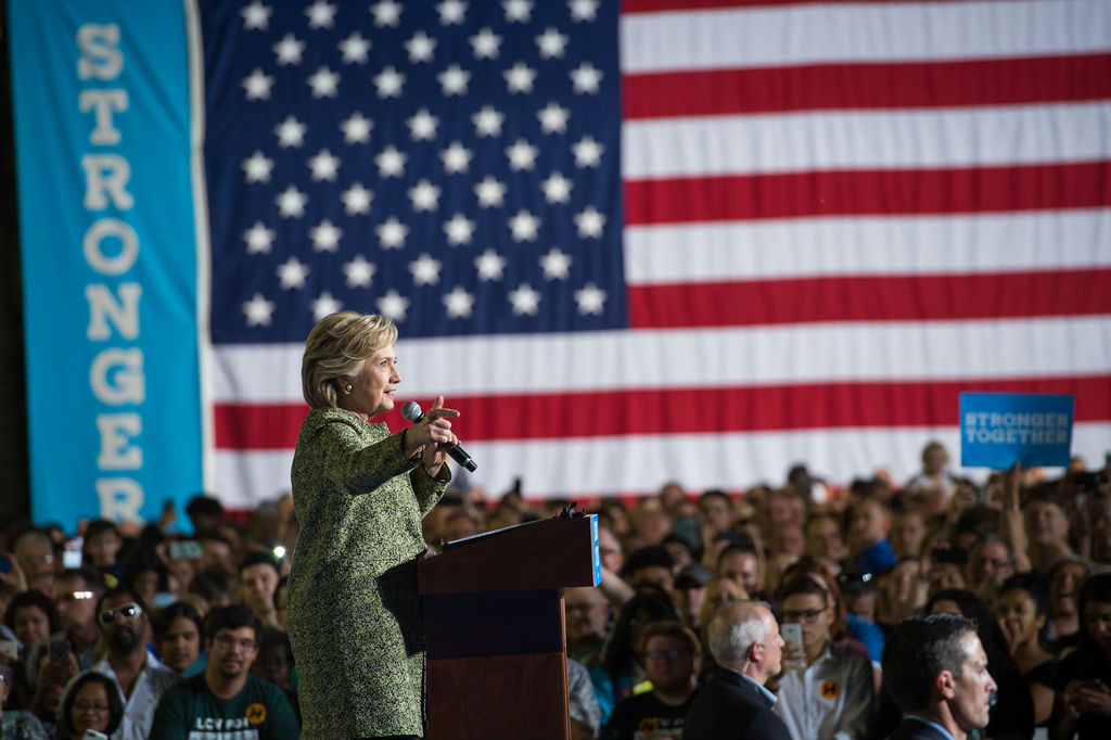 Hillary Clinton Grabbing Crotch of a Man Onstage in a Photograph